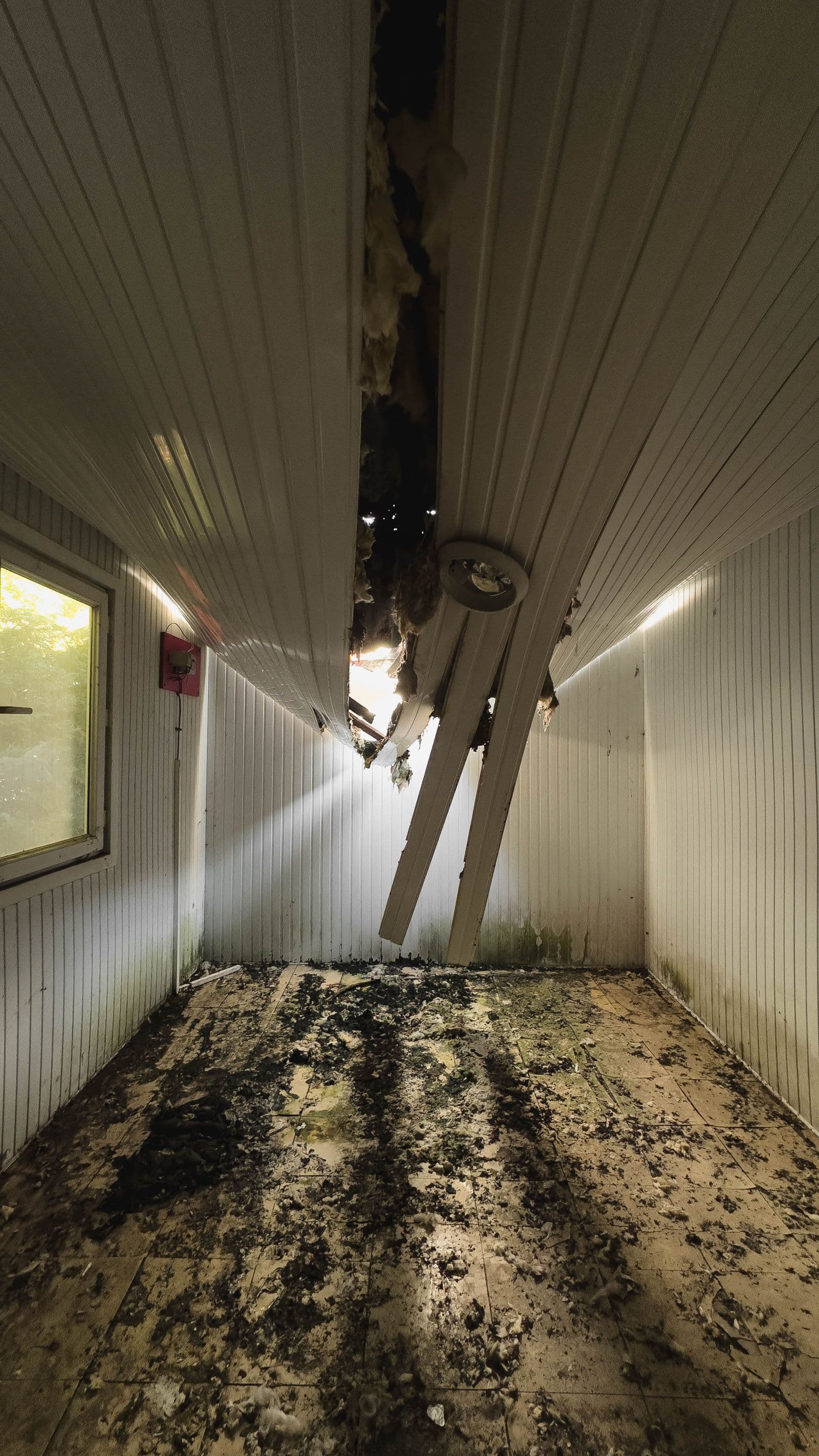 Collapsed ceiling drywall after water damage