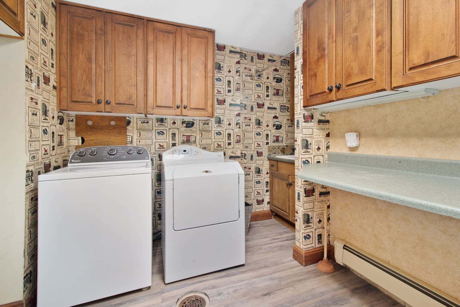 Washer and dryer in a home laundry room, a common source of water leaks